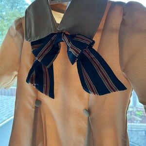 M3GAN Cream Dress with Striped Bow